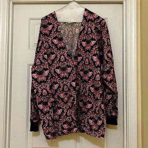 Pretty brown scrub jacket with pretty pink butterflies.